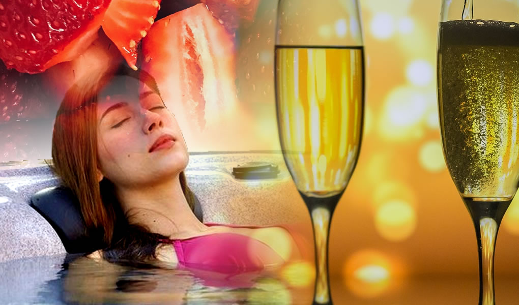 womain in hot tub spa salts strawberries champagne